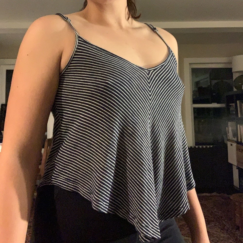 Rosette By Be Cool tank top,size small, could fit up to large.Adjustable straps!